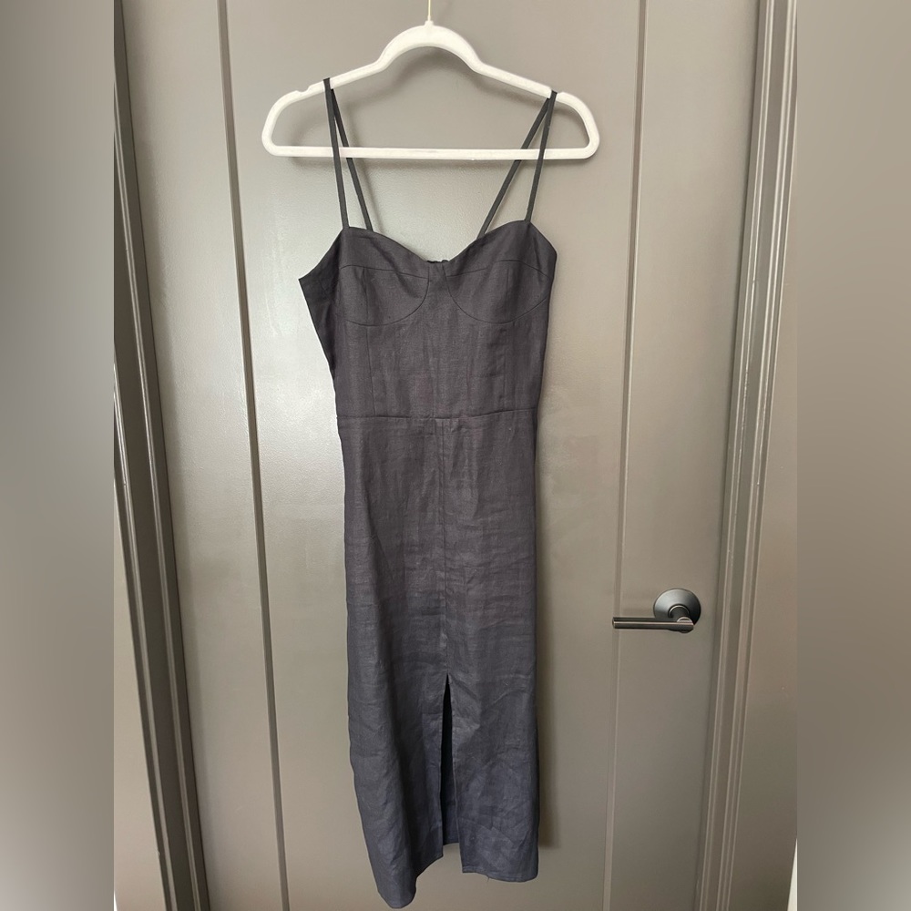 Black linen Reformation dress with a front slit